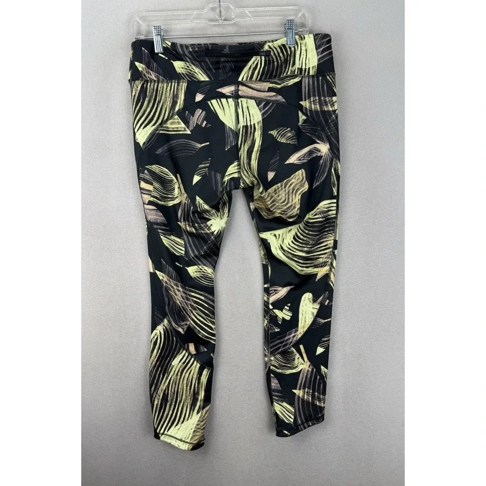 Nike‎ Yoga Dri-Fit Women's Black Yellow Medium Swirl Drawstring Ankle Legging